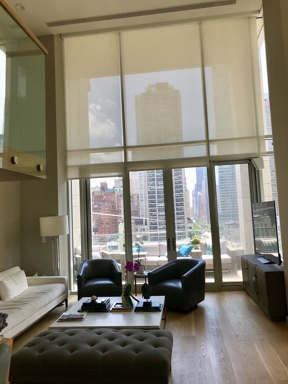 Roller Shades for Tall Windows: Fabric, Hardware, and Motorization